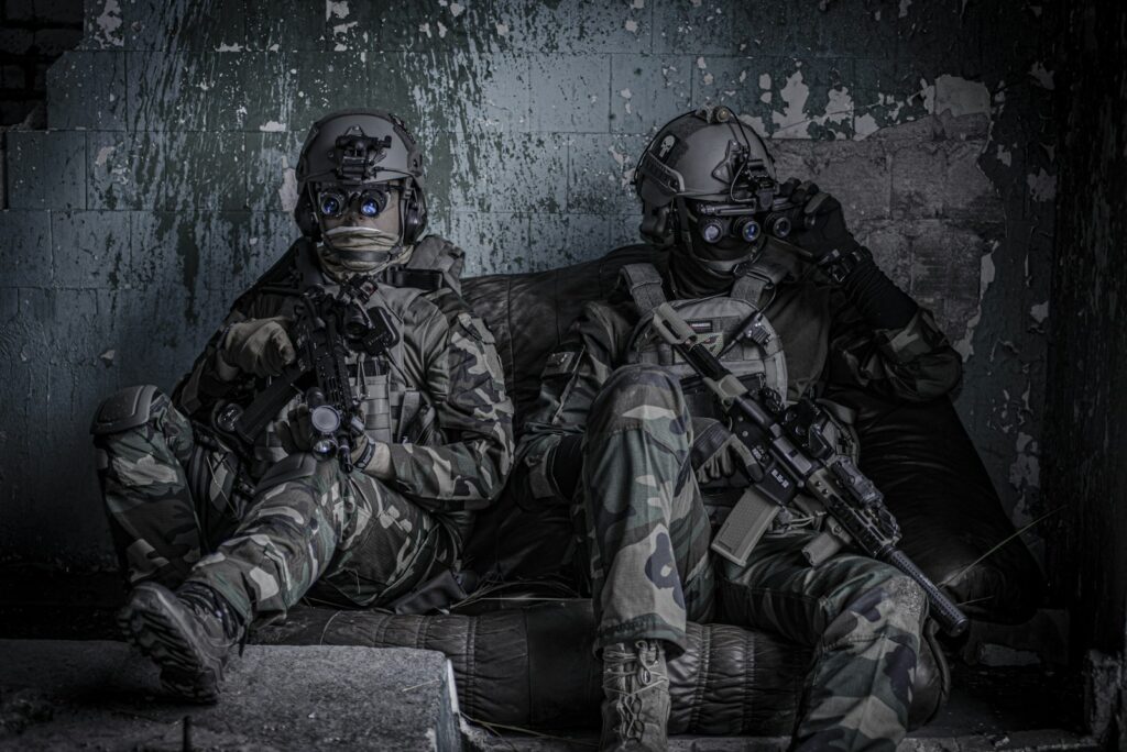 two officers sitting on sofa